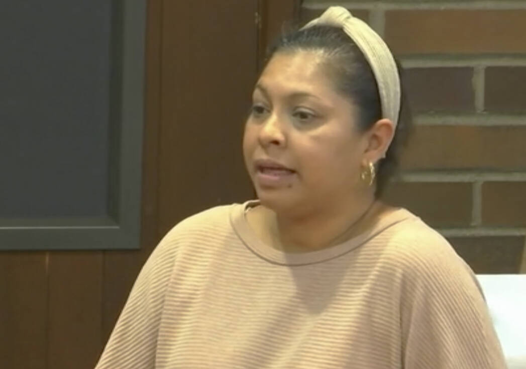 An asylum seeker asks the Kent City Council for housing help at the April 16 meeting. Screenshot via City of Kent