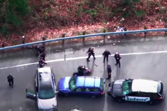 A screenshot of the King County Sheriff’s Office Guardian One helicopter view of the arrest of a Kent man after carjacking incidents Feb. 13 in Kent. COURTESY IMAGE, King County Sheriff’s Office