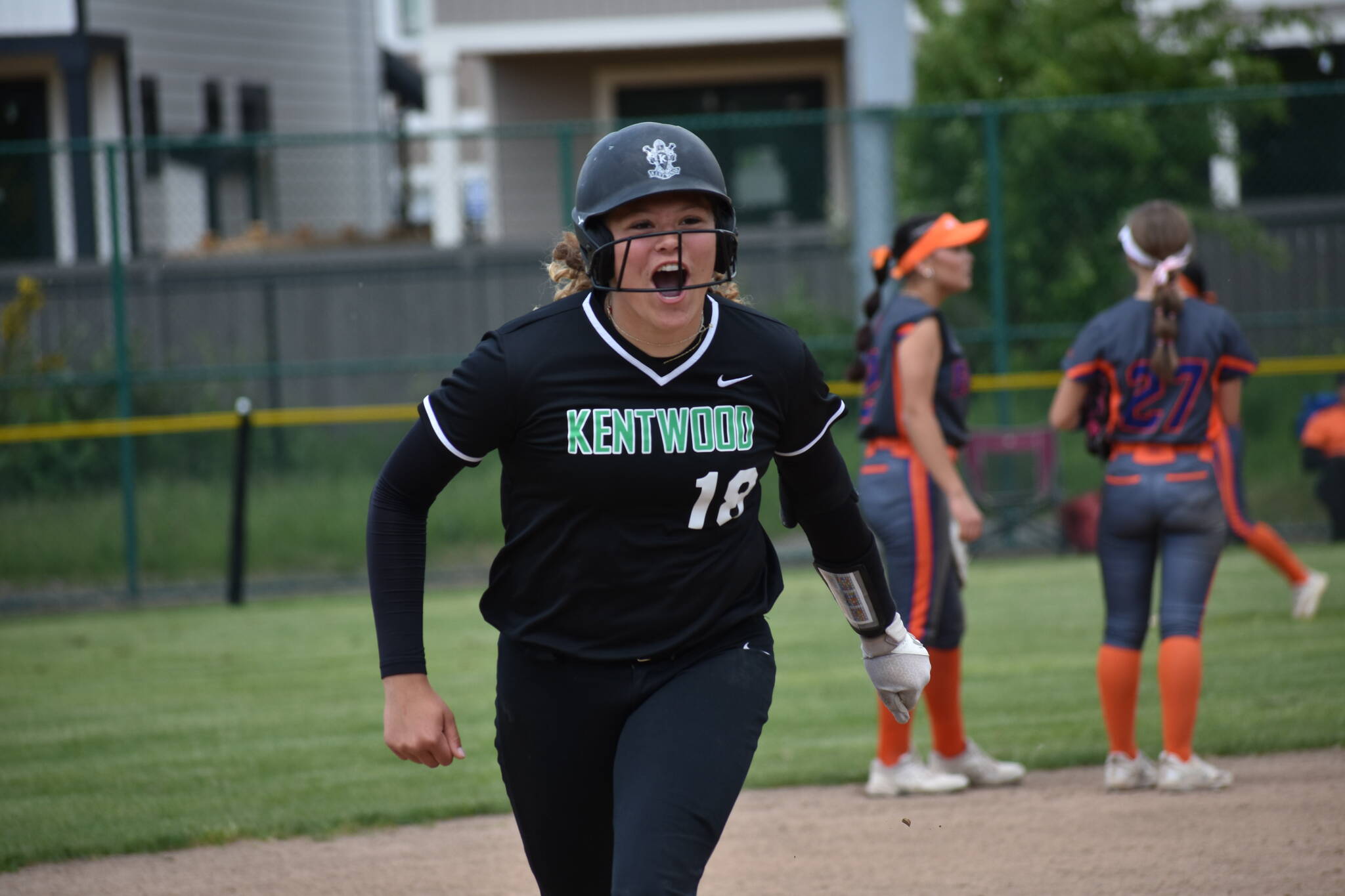 Gabby Greenwood gives a yell after her home run against Graham-Kapowsin. Ben Ray / The Reporter