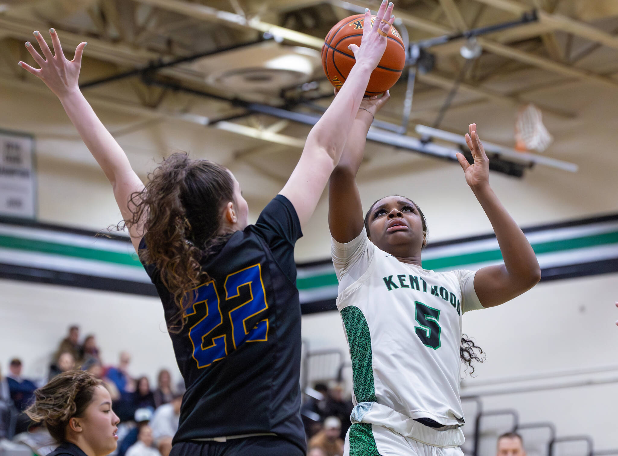 Jessica Ajayi goes for a lay-up against Tahoma. BY ROBBY MULLIKIN