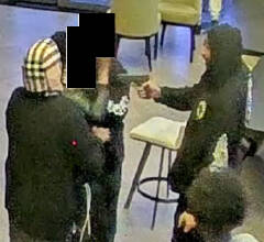 Khaliil Ahmed, aka “Bossup,” 27, of Kent, points a gun. COURTESY PHOTO, USDOJ