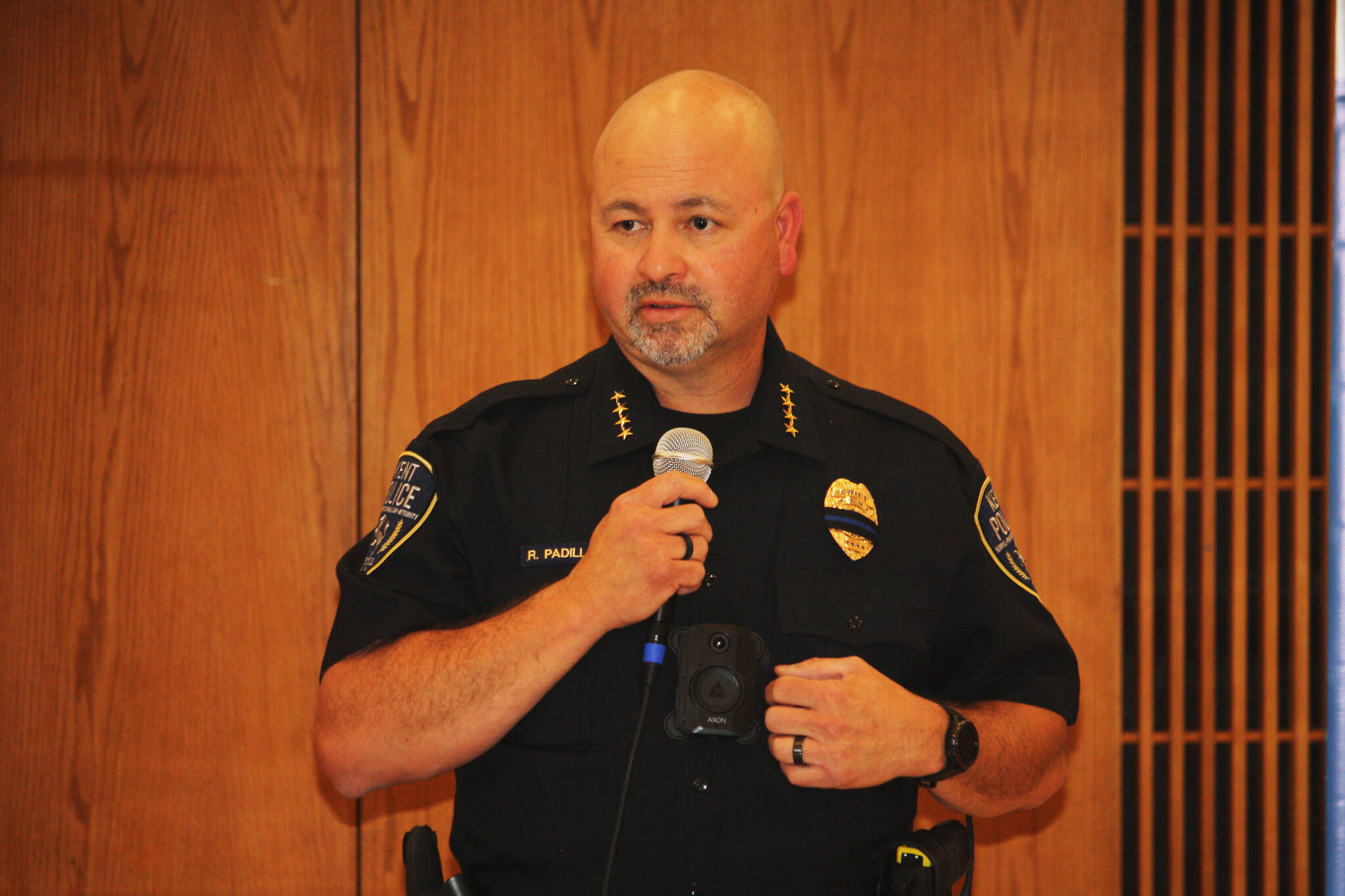 Kent Police Chief Rafael Padilla addresses questions about an officer hiring during an Aug. 12 meeting at the Kent Commons Community Center. STEVE HUNTER, Kent Reporter