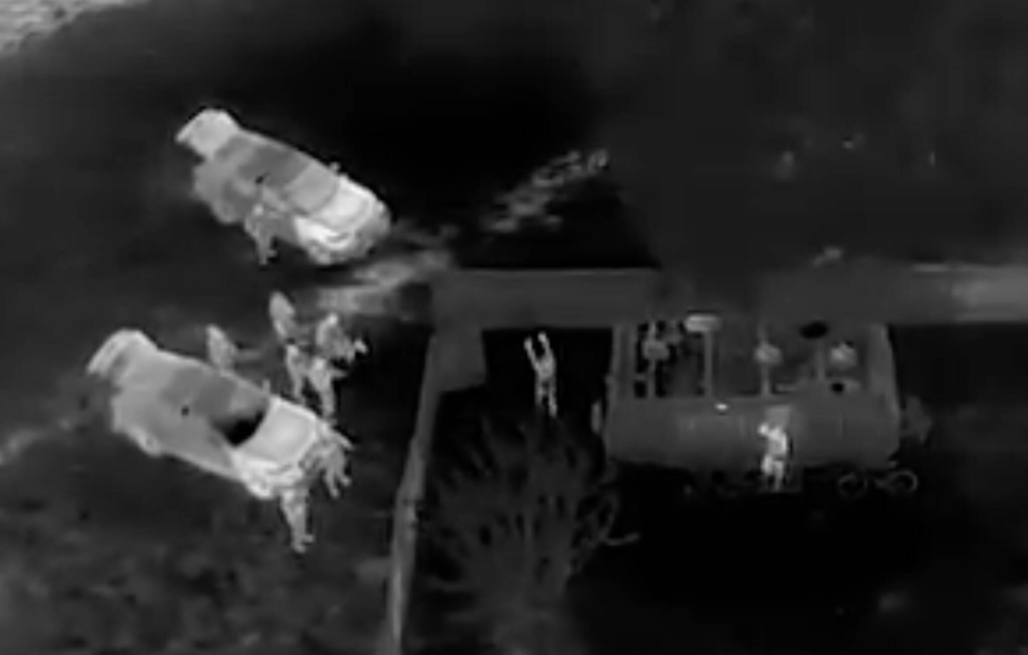 Courtesy photo
Drone footage of Auburn officers arresting a suspect while a second suspect exits the trailer.