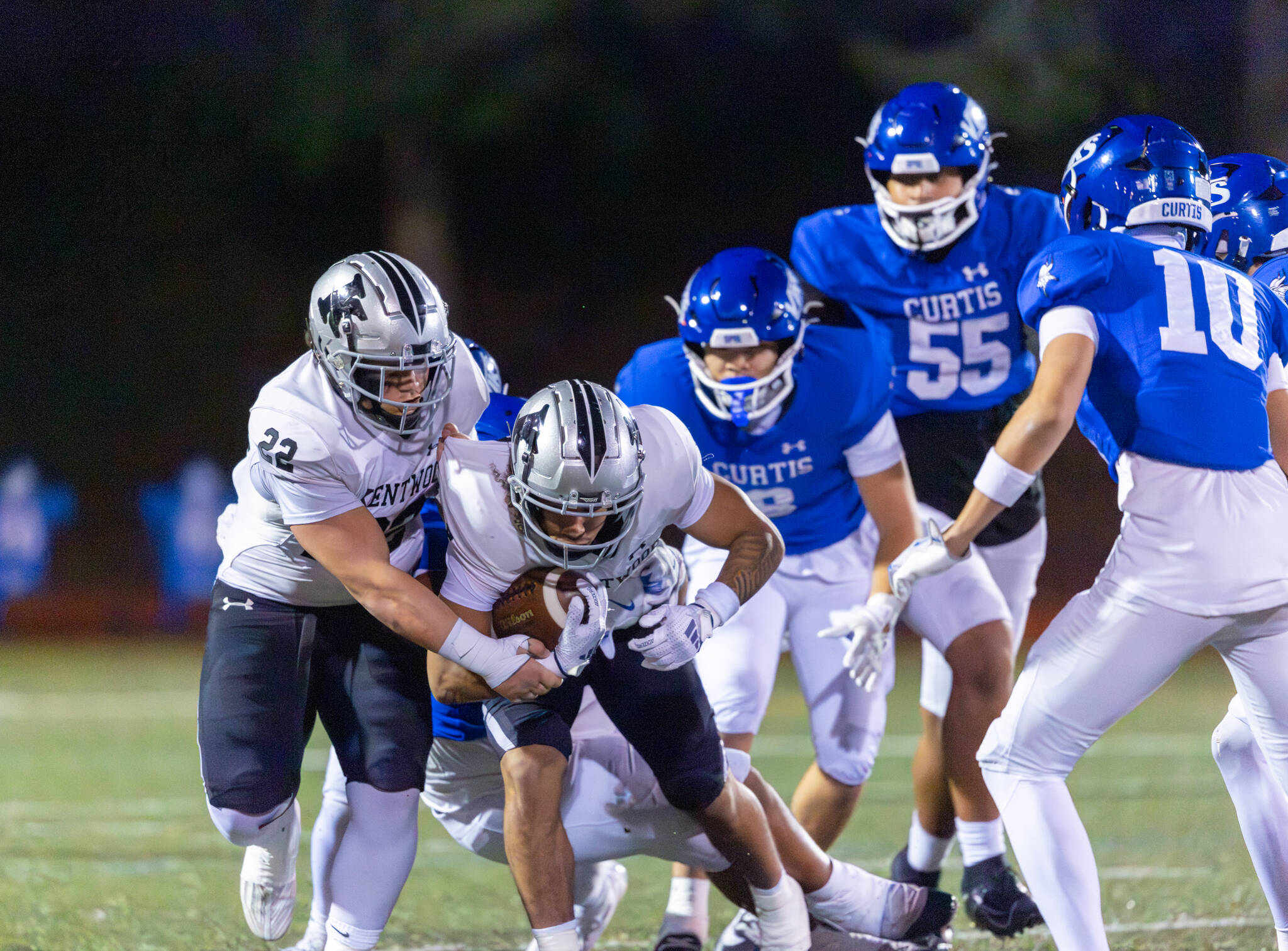 Kentwood players run together to move the ball. Photo provided by Robby Mullikin