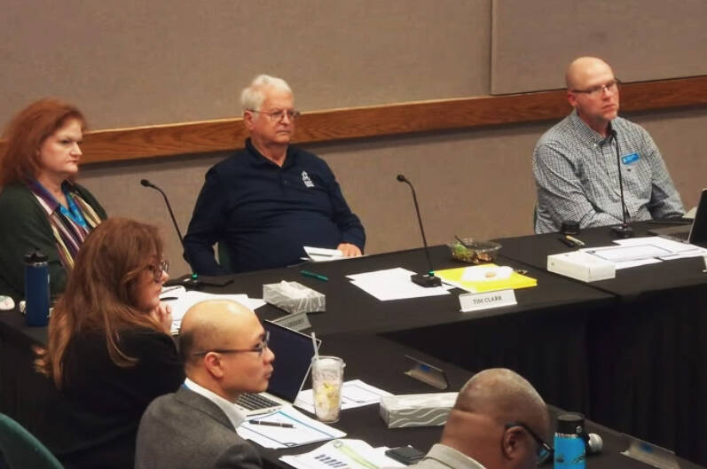 Kent School Board directors Teresa Gregory (top left), Tim Clark and Donald Cook during a Dec. 3 work session with staff about the Kent School District’s budget. VIDEO SCREENSHOT, Kent School District