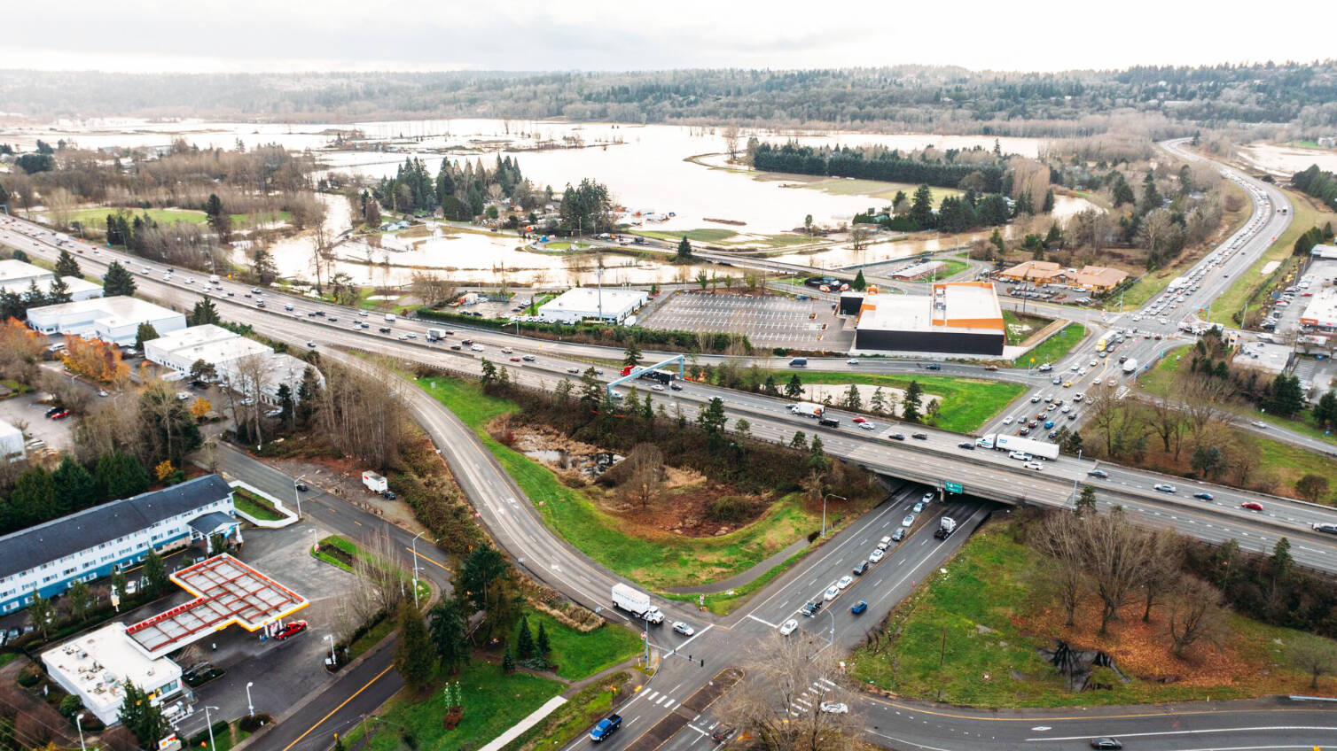 WSDOT reopened all lanes of State Route 167 on Friday afternoon, Dec. 19. Northbound lanes had been closed since the night of Dec. 13. This is looking west toward SR 167 with Willis Street to the right and flooding to the top along West Valley Highway and beyond. COURTESY PHOTO, City of Kent