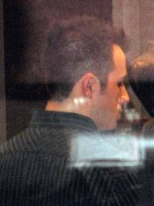 Kent resident Blake Leonard Marter enters his not guilty plea Monday in court at the Norm Maleng Regional Justice Center. Marter has been charged with third-degree child molestation in connection with a Dec. 16 incident where a teenager said she said a man with his pants just above his knees jumped out and grabbed her leg. The white image on the photo is from a reflection on the glass window which Marter was behind in court.