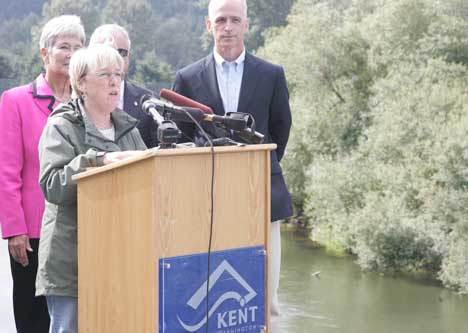 Sen. Patty Murray talks at a press conference along the banks of the Green River Monday in Kent about what residents and the federal government can do to prepare for flooding this winter. Kent Mayor Suzette Cooke