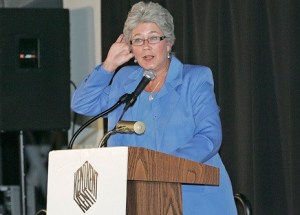 Kent Mayor Suzette Cooke waits for an audience response during her State of the City address Feb. 2 at the Kent Chamber of Commerce luncheon at the ShoWare Center.