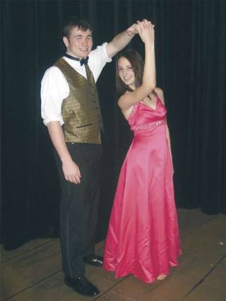A waltz to remember Maple Valley Youth Orchestra musicians Micheal French and Kalya Warr show off some waltz moves. The orchestra will present a Waltz Gala Ball