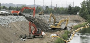 The Kent city hearing examiner approved work on two more Green River levees similar to this repair work a few years ago near the Riverbend Golf Complex.