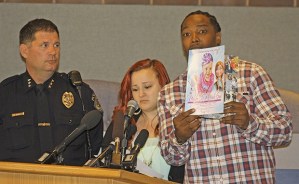 Kent Police Chief Ken Thomas at a press conference on Monday at City Hall with Lisa Lynch and Martrice Grant