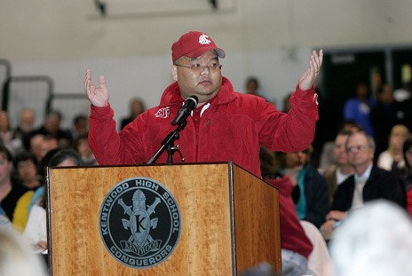 Dan Williamson tells the Kent School Board at a district budget hearing Tuesday night at Kentwood High School that they need to cut salaries of administrators before cutting elementary music and P.E. programs.