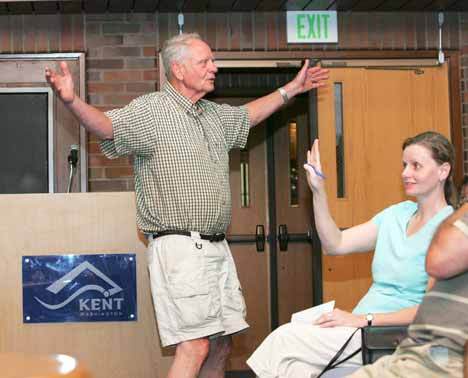 Kent resident Paul Morford vents his spleen at the Kent City Council Tuesday after their vote to pass the property tax wavier without opening the floor to comments.