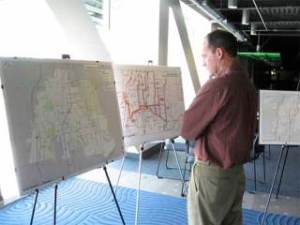 Greg Haffner of the Curran Law Firm studies a display for the city's transportation plan May 21 during a Roundtable discussion hosted by the Chamber of Commerce at the ShoWare Center.