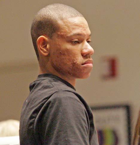 Andre O. Johnson pleads not guilty to charges of animal cruelty during his arraignment Oct. 14 at the Norm Maleng Regional Justice Center in Kent.