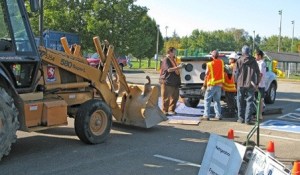 A resident drops off a stove at a Kent recycling event. The fall collection event is Oct. 11 at Russell Road Park.
