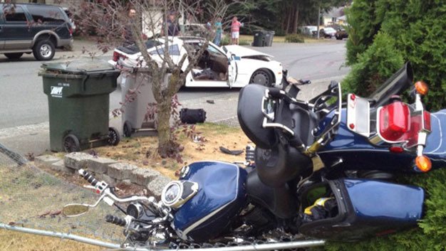 A 56-year-old Kent man died after a car struck his motorcycle Wednesday morning along Southeast 223rd Drive in the Panther Lake area of Kent.