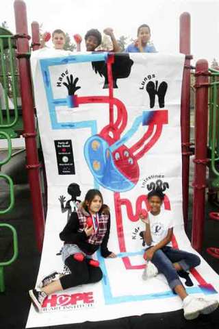 Scenic Hill students pose with their new Healthy Heart Poster. Top from left: Luis Vargus Conwell