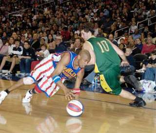 Harlem Globetrotter Scooter Christensen displays his dribbling skills.
