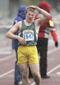 Kentridges Ryan Carter winces after crossing the finish line of the 3
