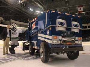 Allied Waste Services’ Chris Guimond stands Wednesday with Seattle Thunderbirds mascot Cool Bird