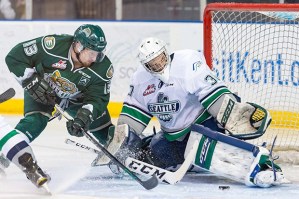 T-Birds goalie Landon Bow denies the Silvertips' Remi Laurencelle during WHL action Friday night at the ShoWare Center. Bow made 21 saves in Seattle's ninth straight win.