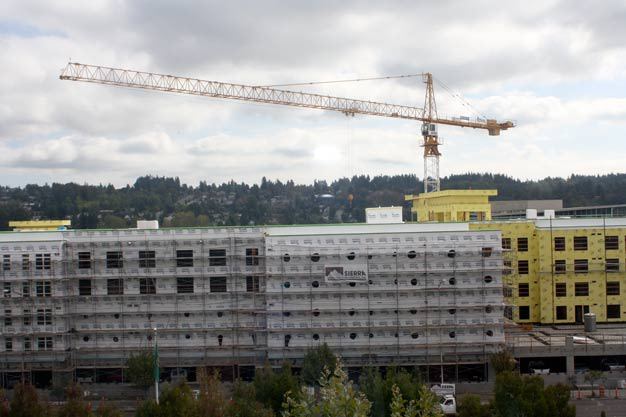 Crews are about 50 percent finished with the new Kent Station apartments going up along Fourth Avenue North. Crews are scheduled to take the crane down next week. The complex is expected to be done next May.