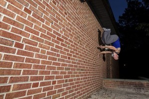 Justin Gielski keeps nimble as he trains on a brick wall. The Kentlake High School graduate and New Jersey National Guardsman remains alive in ‘American Ninja Warrior’