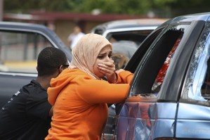 Simulated shock: Hannah Madani acts distraught with other student leaders during a simulated car crash scene as part of the Gift of Life simulation present by the Kent Fire Department.