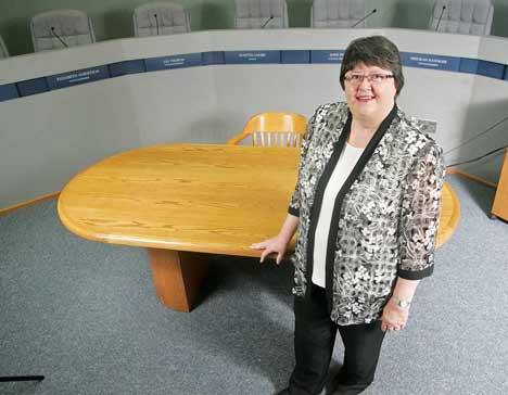 Kent City Clerk Brenda Jacober has served the city for 35 years. She's pictured in Council Chambers at City Hall