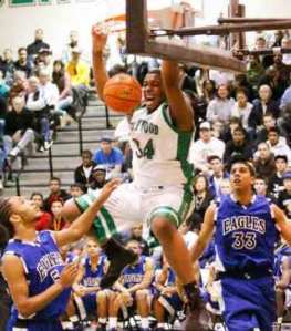 Kentwood’s Joshua Smith throws down a dunk against Federal Way earlier in the season. Smith