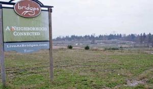 The commercial development is part of a proposal by YarrowBay to build 379 single-family homes