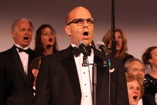 Alan Lake sings with the Breath of Aire choir May 7 at the Kent Covenant Church as a benefit to collect food and funds for the food bank.