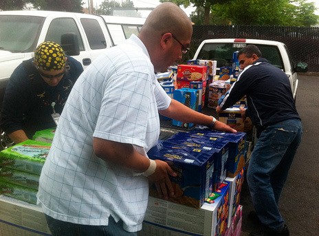 The Kent Food Bank receives donations Wednesday from the King County Facilities Management Division.