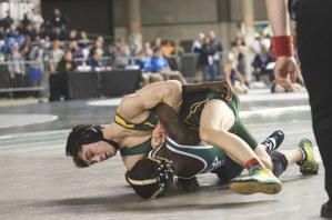 Kentridge sophomore Derek Freitag takes on Mill Creek's Cole Anderson in a first-round bout at Mat Classic Friday. Freitag won by fall at 1:11.