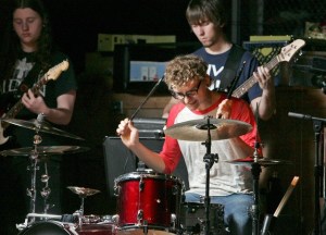 Kent-Meridian drummer Brad Hill performs during a rehearsal for the school's musical 'Little Shop of Horrors' that opens May 5. Hill also plays in a band outside of school that recently performed in Austin