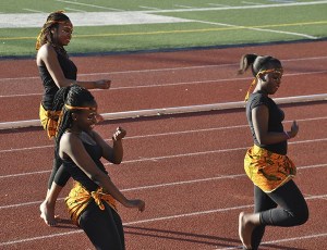 Kent-Meridian High School's African Youth Club performs a dance during the Kent School District's K-Day at French Field on April 19.