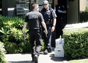 The city of Kent would hire six police officers in 2014 under a budget ordinance that goes before the City Council on Tuesday