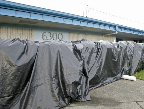 Kent School District officials will keep sandbags around Neely-O'Brien Elementary School