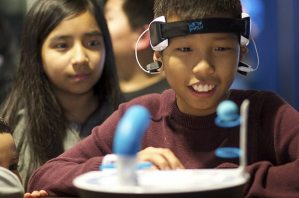 Mind games: Nealin Becker plays a concentration game on interactive display at the Kent School District’s Tech Expo on Tuesday at the ShoWare Center.