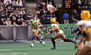 Seattle Mist quarterback Laurel Creel fires a pass against the Green Bay Chill during a Legends Football League game Saturday at the ShoWare Center in Kent. The Mist won 55-36.