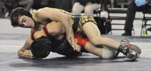 Kentridge's Derek Freitag handles Sunnyside's Elias Romero in the 113-pound final at Mat Classic on Saturday. Freitag pinned Romero in 4:44 to secure his second straight state title.