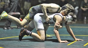 Kentridge’s Derek Freitag defeats Bonney Lake’s Carson Corbaley in the 106-pound division at the  All-SPSL championships Dec. 30-31 at Auburn High School. Freitag finished first at 106.