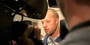 Patrick Auble talks to reporters in September outside a courtroom at the Norm Maleng Regional Justice Center in Kent.