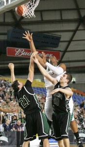 Kentwood's Joshua Smith goes through Jackson's Andy Gay