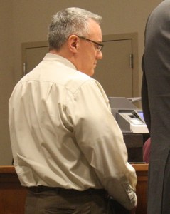 Kevin L. Baker enters a not guilty plea on Monday to 14 counts of theft from the Kent Little League during his role as treasurer of the organization.