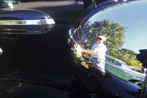 Keith Shoemaker puts the final touches on his 1936 Chevrolet Sports Master Deluxe during the second annual Kent Downtown Partnership Rod & Custom Car Show last Saturday.