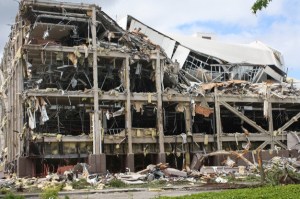 Crews begin to demolish old Boeing office buildings last week along South 212th Street to make room for two new warehouses