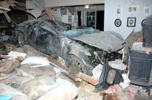 A Kent man was killed after he crashed a late-model Infiniti about 30 feet into a Kent home at about 12:30 a.m. Thursday in the 28200 block of 144th Avenue Southeast. A woman in the house escaped injury when she left the living room for the kitchen just before the crash.